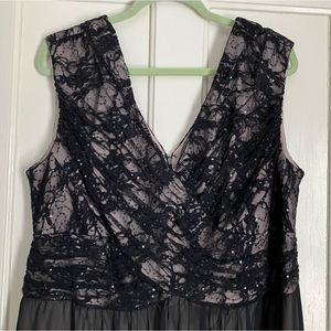 Full length black and tan polyester sequined gown.